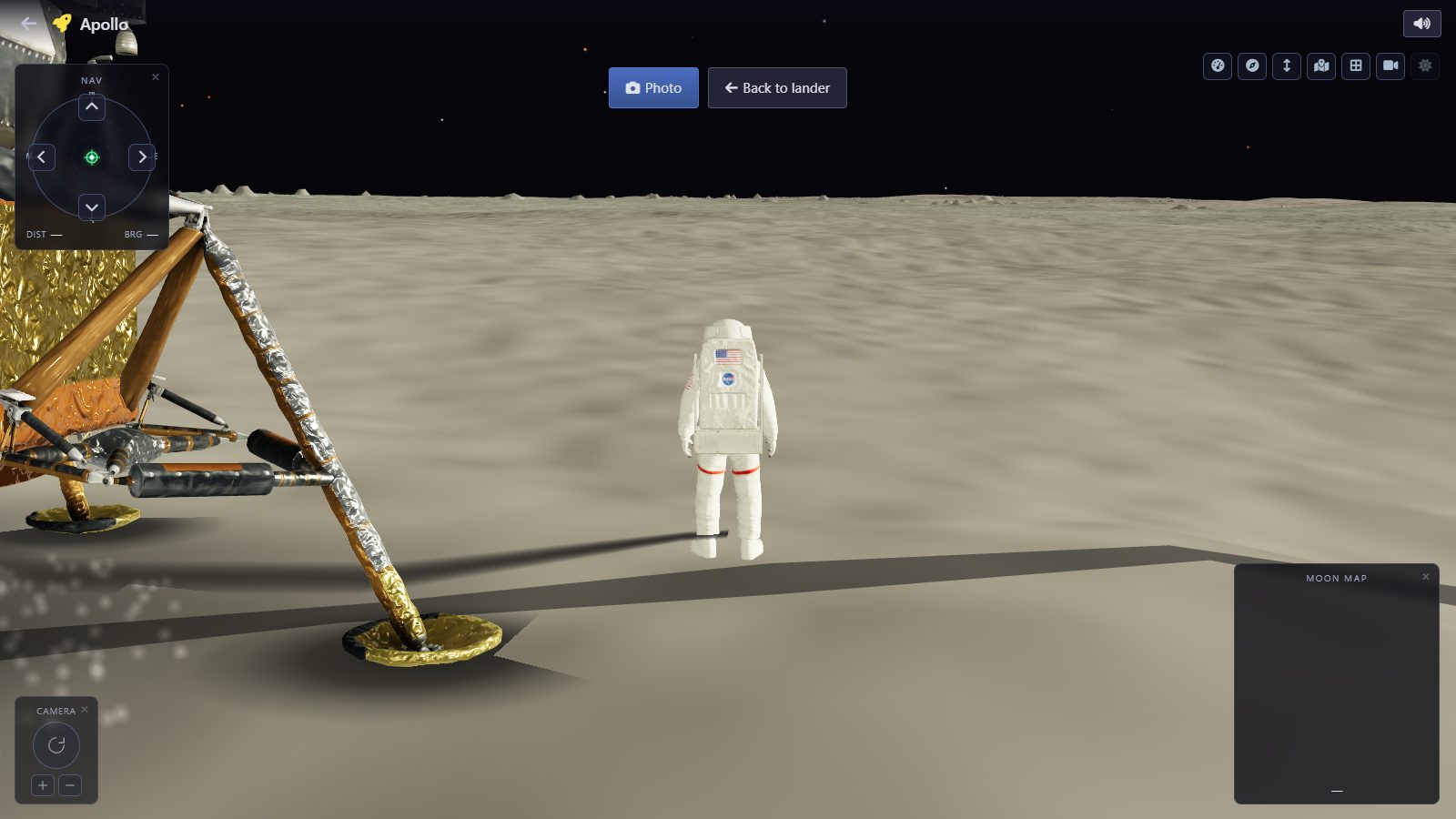 Astronaut walking on the lunar surface beside the lunar module in the Apollo moonwalk sandbox