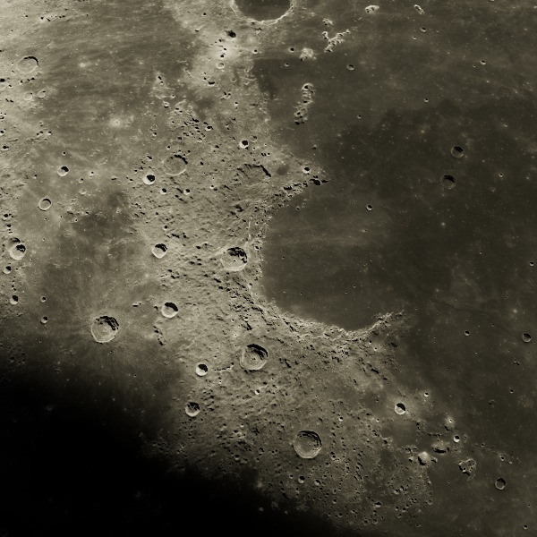 Montes Jura — relief close-up under low, raking sunlight near the terminator