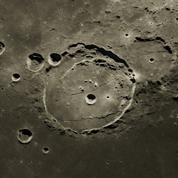 Posidonius — relief close-up under low, raking sunlight near the terminator