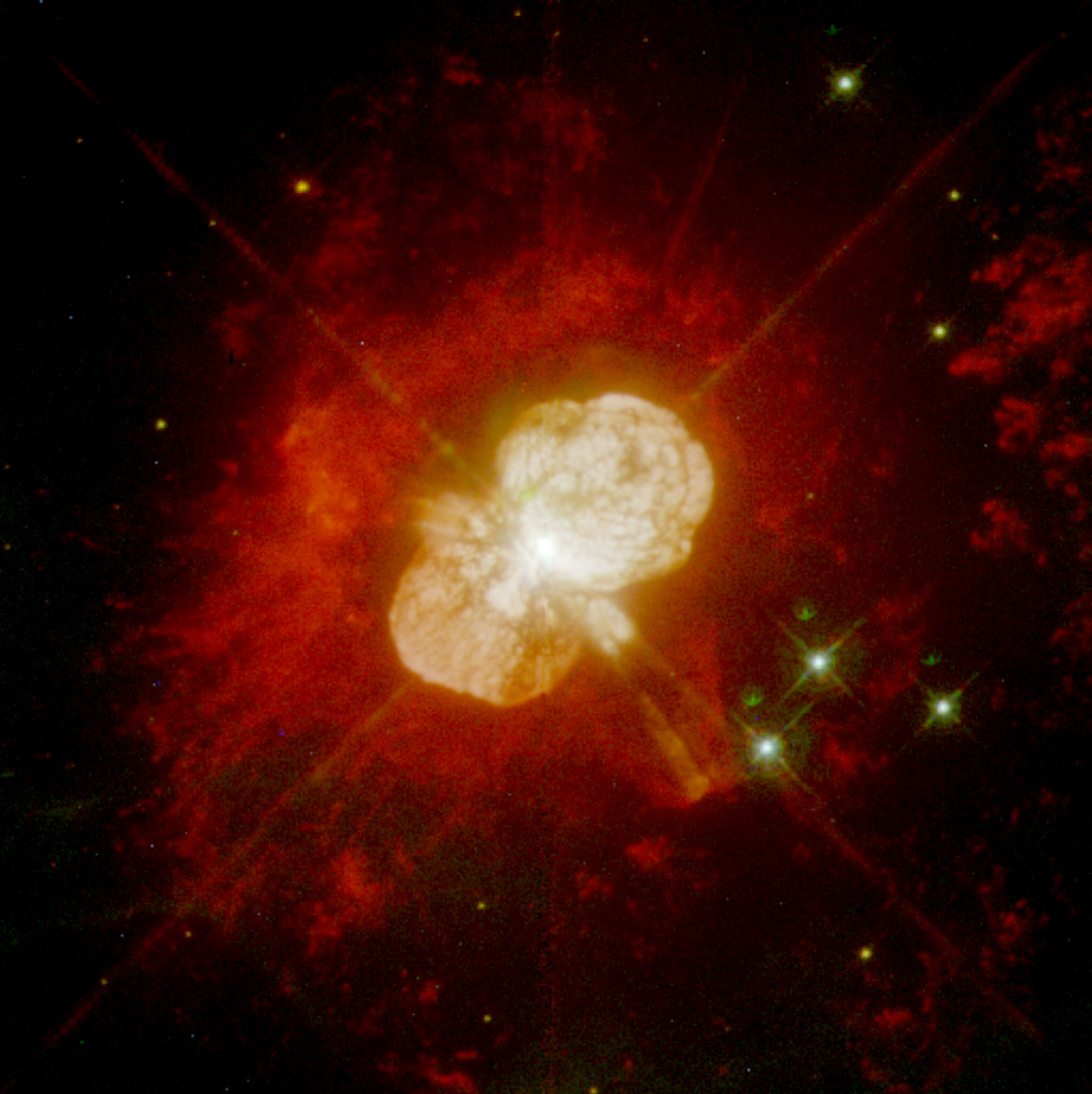 Hubble Space Telescope image of Eta Carinae showing the bipolar Homunculus Nebula — two billowing lobes of gas expanding outward from the central supermassive star.