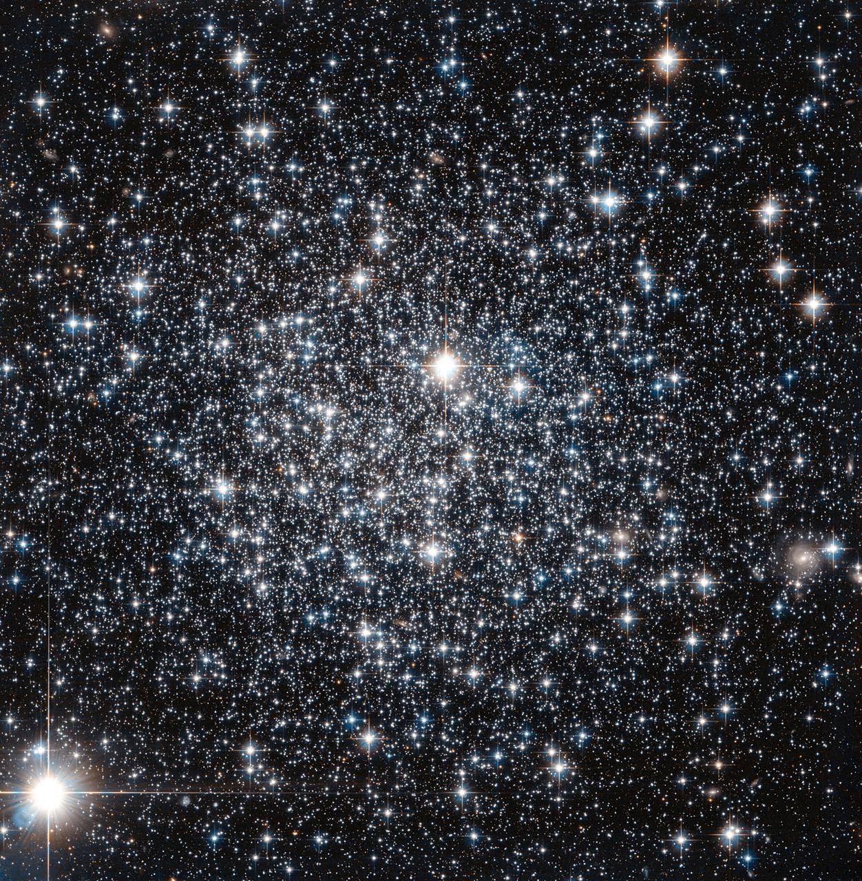 A Hubble image of a globular star cluster with its dense golden core of ancient stars